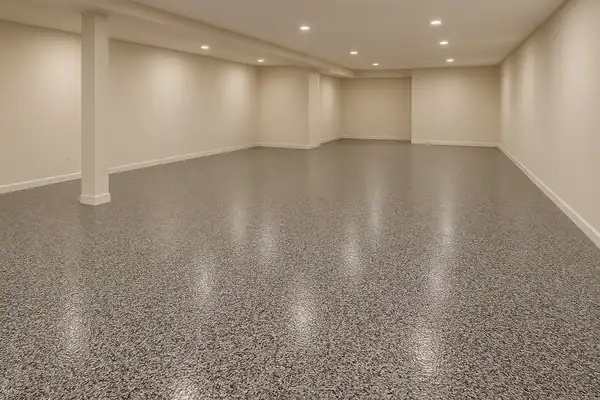 Rendered preview of a flake epoxy basement floor in the Domino blend