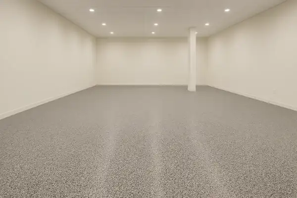 Rendered preview of a speckled, granite-look epoxy commercial shop floor