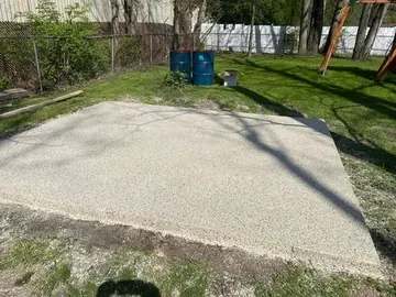 Light flake epoxy on a backyard concrete slab — a Greater Cincinnati job