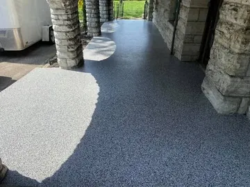 Flake epoxy on an outdoor patio slab — a Greater Cincinnati job