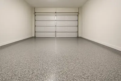 Two-car garage render with domino flake epoxy