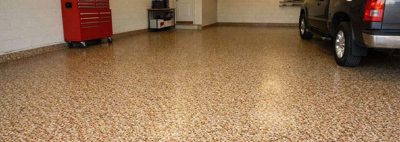 Tan flake epoxy garage floor with a pickup truck parked on it, Cincinnati, OH