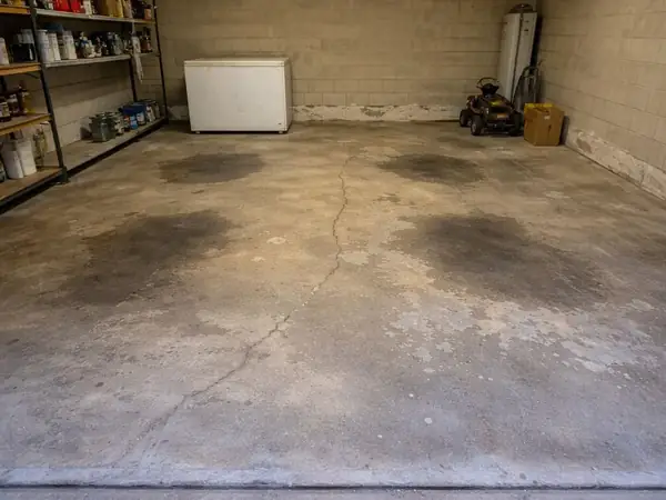 Garage floor before epoxy repair