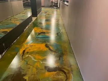 Blue, green and gold metallic epoxy down a commercial hallway — a Greater Cincinnati job